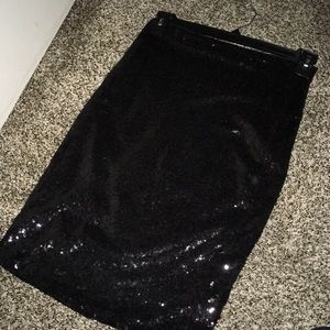 Beautiful sequin black skirt in new condition.
